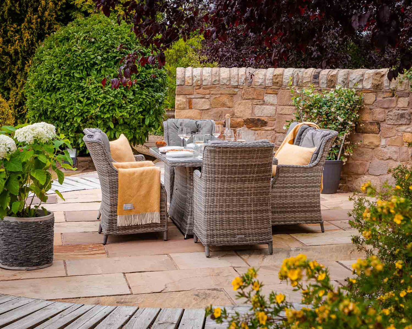 Riviera 6 Rattan Garden Chairs and Rectangular Fire Pit Dining Table in Grey