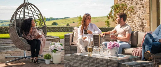 A picture of a couple of people enjoying time in the garden: alfresco entertaining