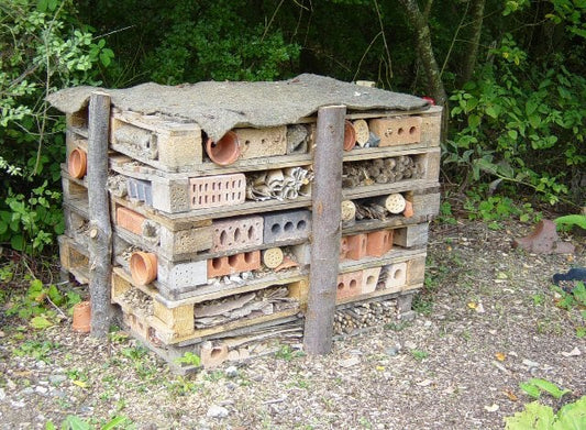 Insect hotel or bug mansion. Pallet