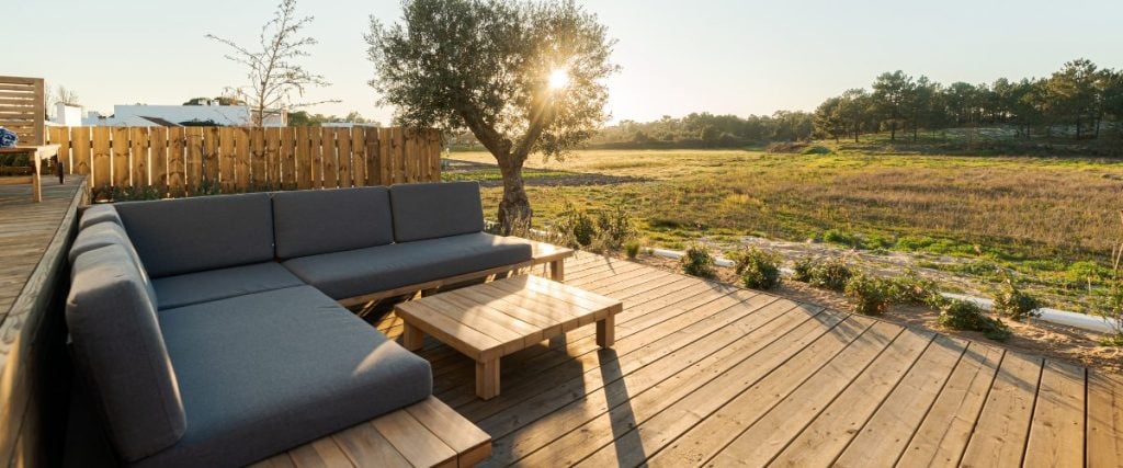 A picture of some outdoor furniture on a deck: how to prepare for spring