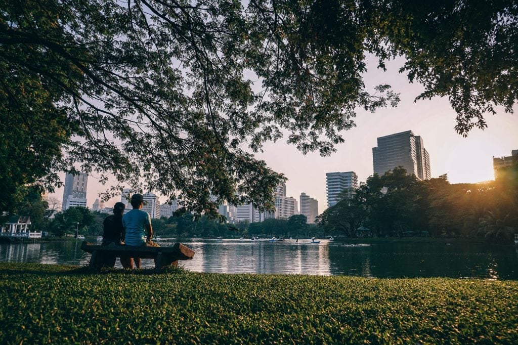 People sitting on a park bench