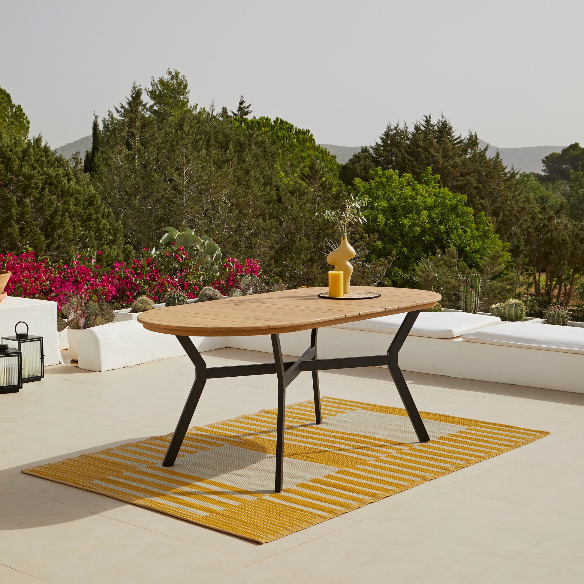 Ezra 6 Seater Oval Wooden Garden Dining Set with 6 Hali Black Rope Chairs - Laura James 
