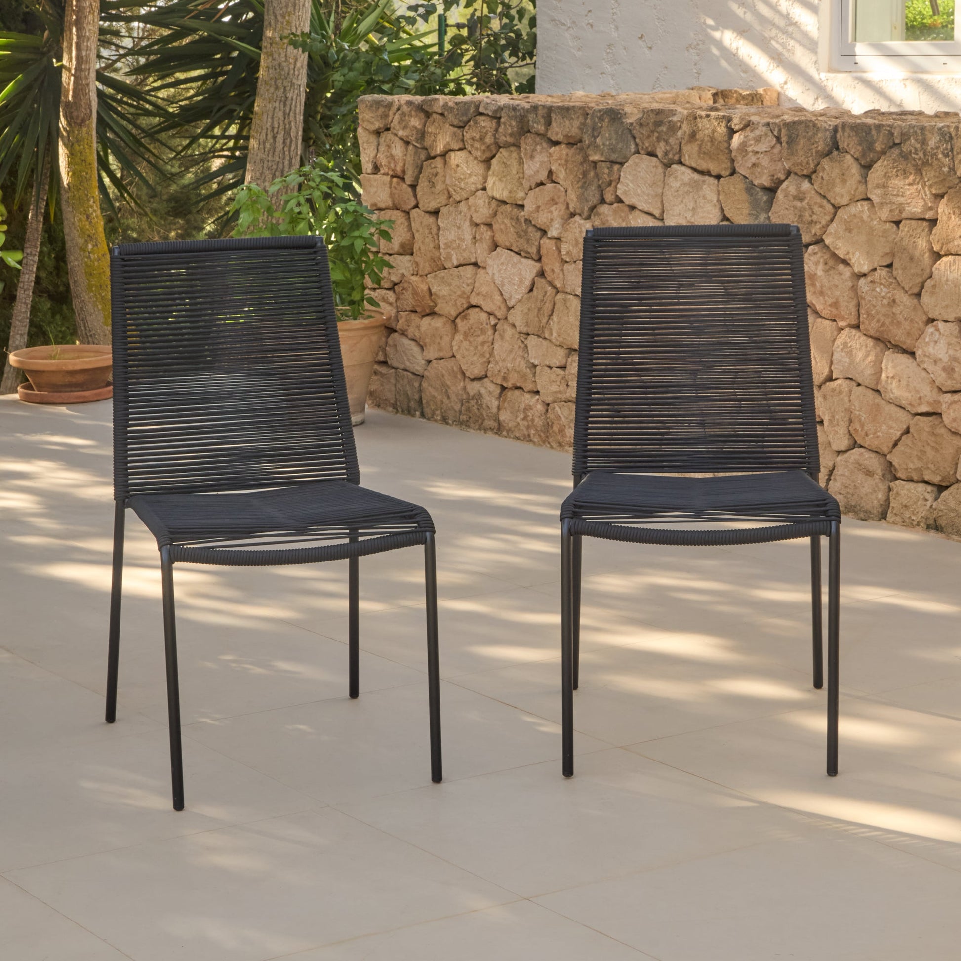 Ezra 6 Seater Oval Wooden Garden Dining Set with Ryder Black Chairs -Laura James