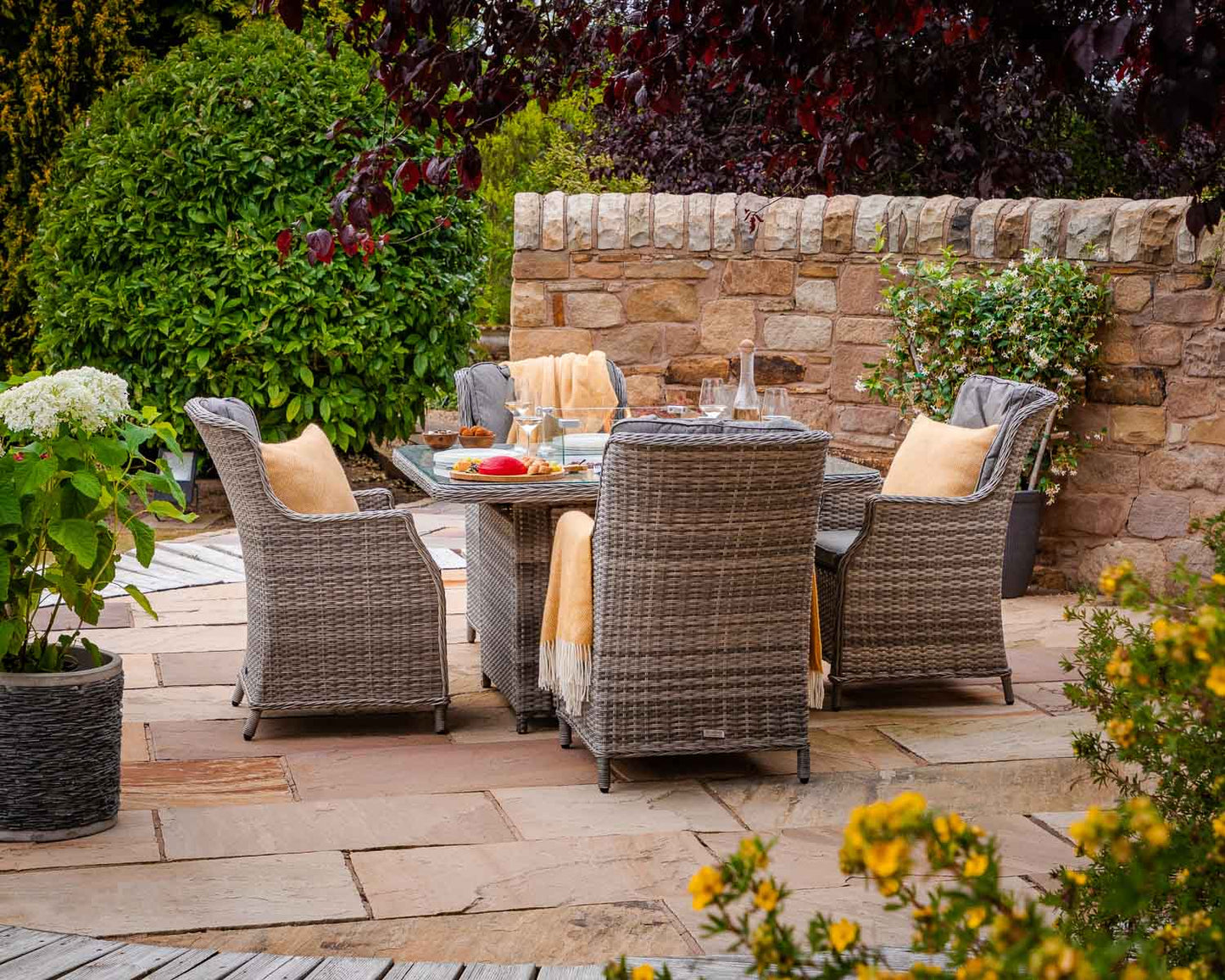 Riviera 4 Rattan Garden Chairs and Square Fire Pit Dining Table in Grey