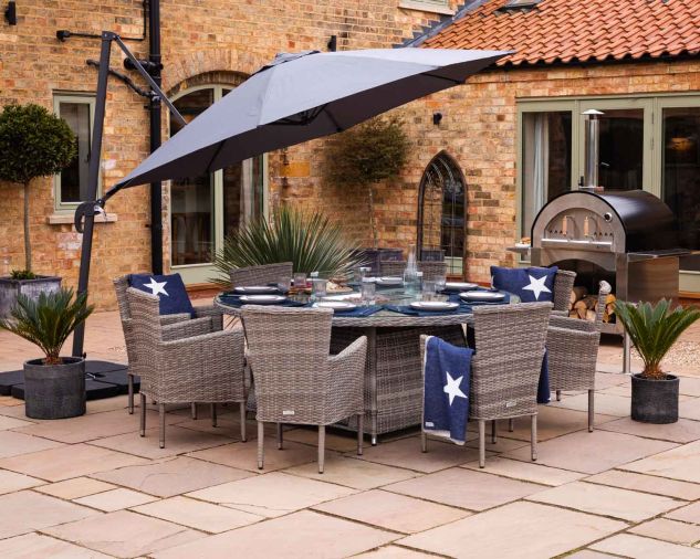 Cambridge 8 Rattan Garden Chairs And Large Round Fire Pit Dining Table In Grey Direct - Round Garden Furniture With Fire Pit Table
