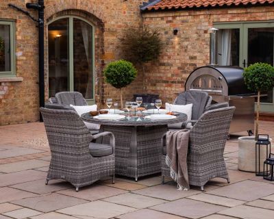 Marseille 4 Rattan Garden Chairs and Round Fire Pit Dining Table in Grey