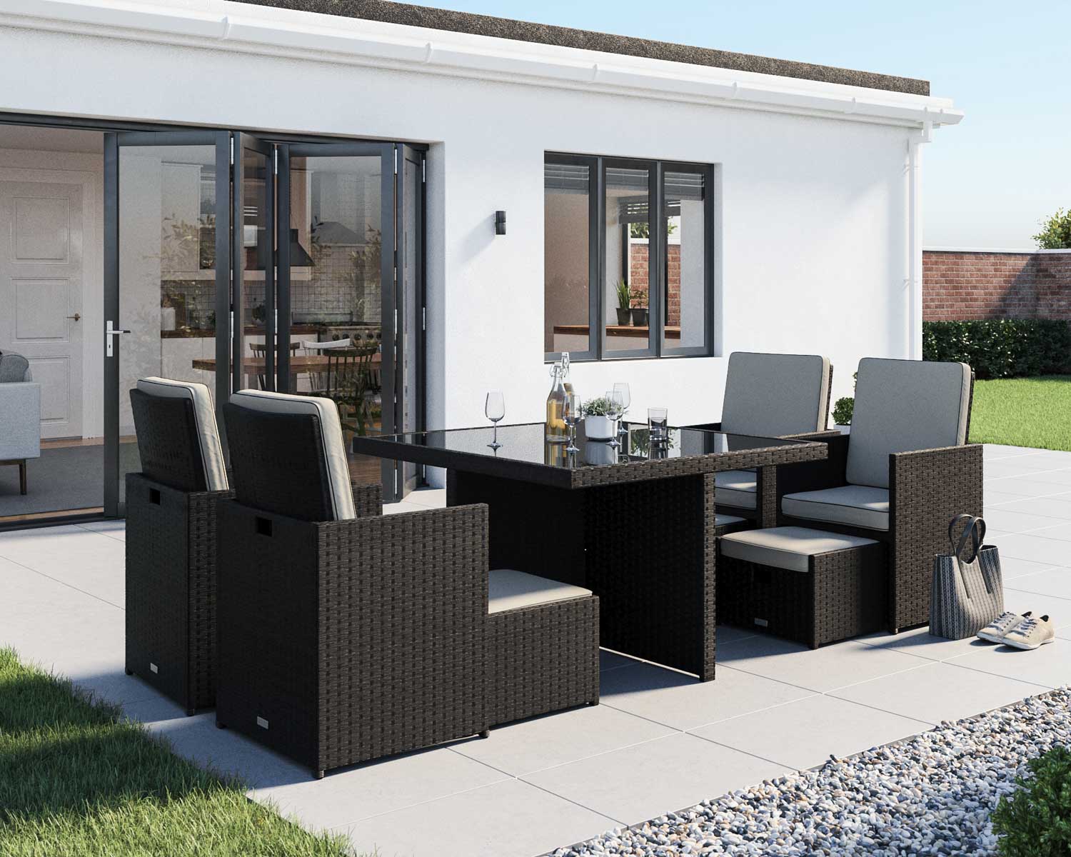 Product photograph of 4 Seat Rattan Garden Cube Dining Set In Black White With 4 Footstools - Barcelona - Rattan Direct from Rattan Direct