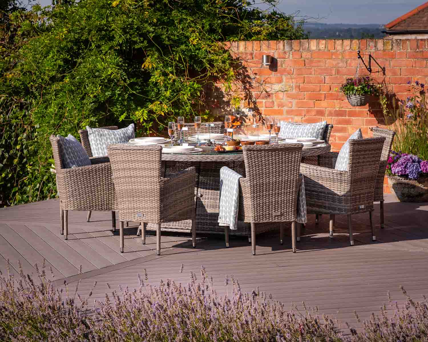 Product photograph of 8 Seater Rattan Garden Dining Set With Large Round Table In Grey With Fire Pit - Cambridge - Rattan Direct from Rattan Direct