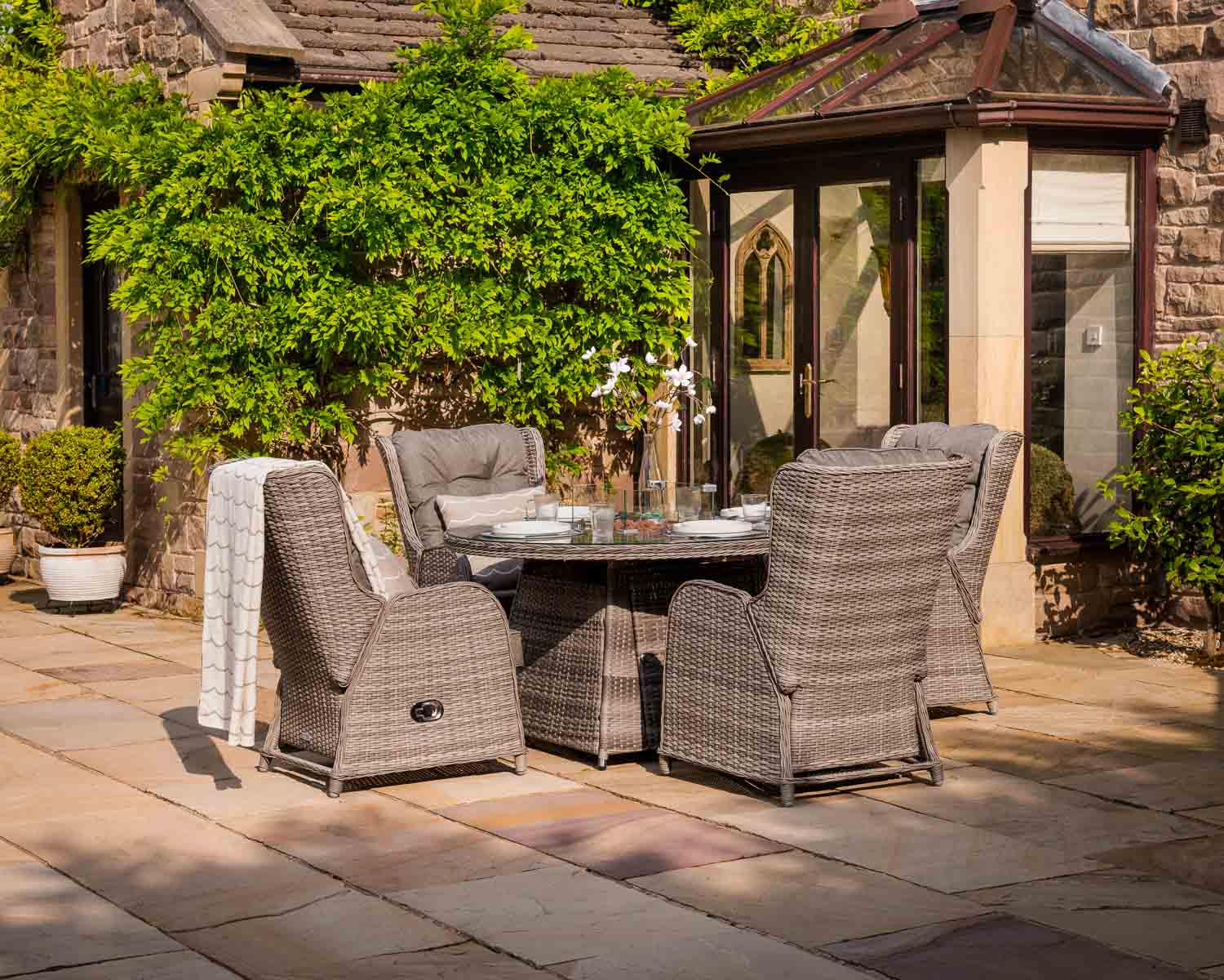 Product photograph of 4 Reclining Rattan Garden Chairs Round Fire Pit Dining Table In Grey - Fiji - Rattan Direct from Rattan Direct