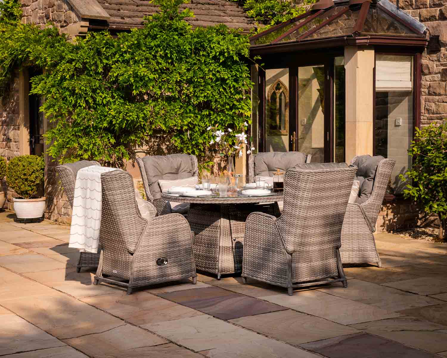 Product photograph of 6 Reclining Rattan Garden Chairs Round Fire Pit Dining Table In Grey - Fiji - Rattan Direct from Rattan Direct