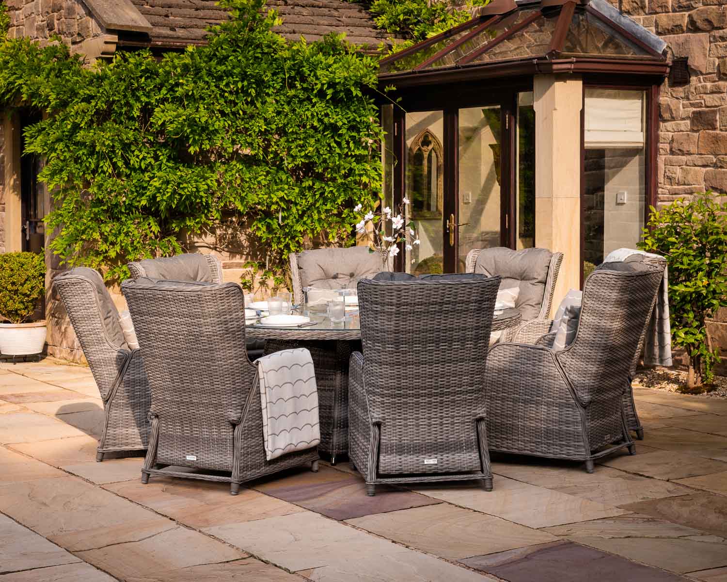 Product photograph of 8 Reclining Rattan Garden Chairs Large Round Fire Pit Dining Table In Grey - Fiji - Rattan Direct from Rattan Direct