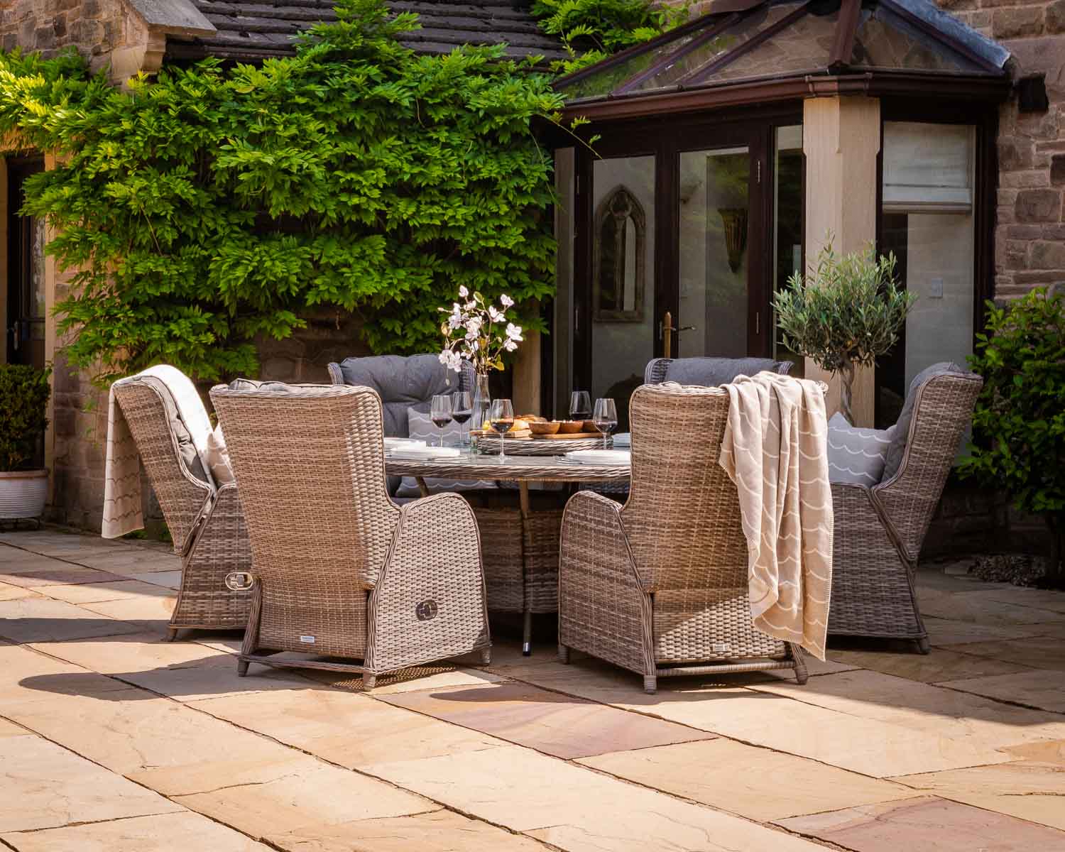 Product photograph of Reclining Rattan Garden Dining Set With 6 Chairs Large Round Table In Grey - Fiji - Rattan Direct from Rattan Direct