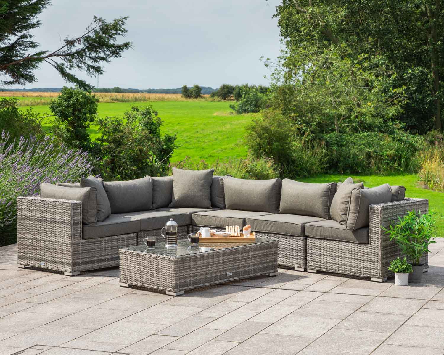 Product photograph of 7 Piece Rattan Garden Corner Sofa Set With Coffee Table In Grey - Geneva - Rattan Direct from Rattan Direct