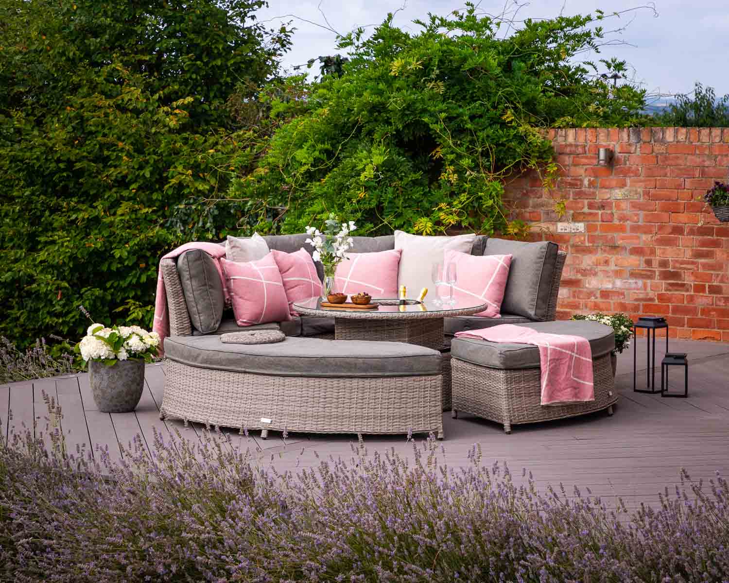 Product photograph of Round Rattan Garden Day Bed With Ice Bucket Table In Grey - Amalfi - Rattan Direct from Rattan Direct