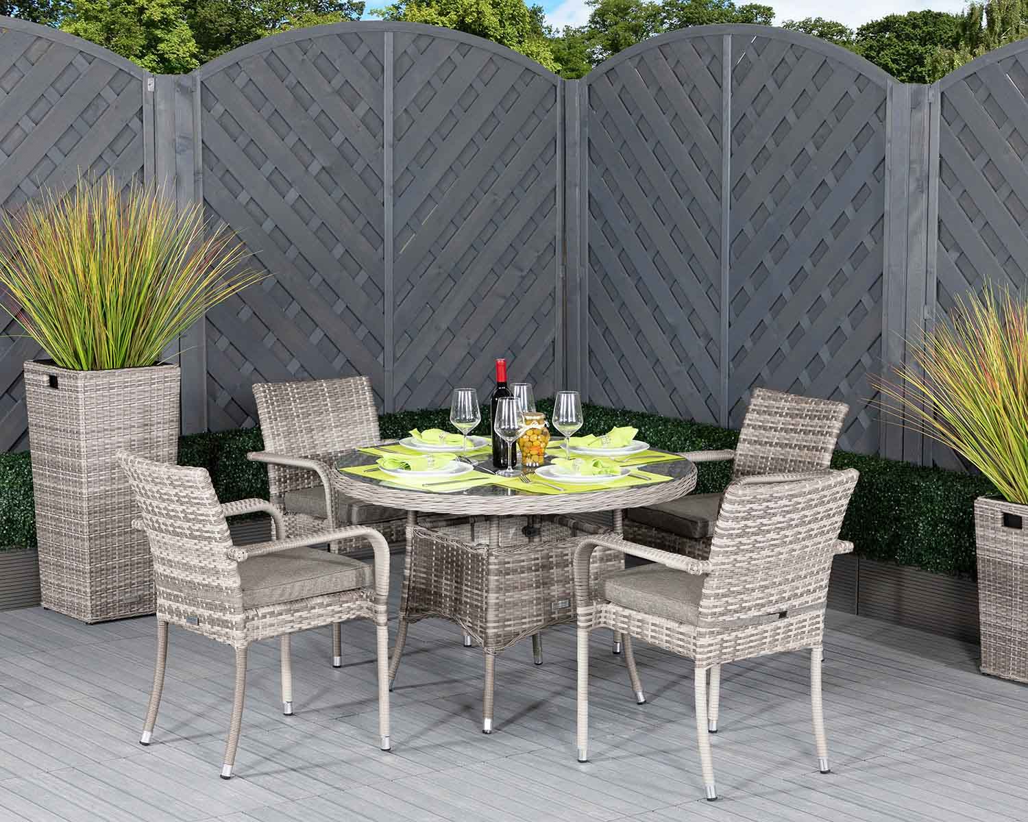 Product photograph of Small Round Rattan Garden Dining Table 4 Armed Stacking Chairs In Grey - Roma - Rattan Direct from Rattan Direct