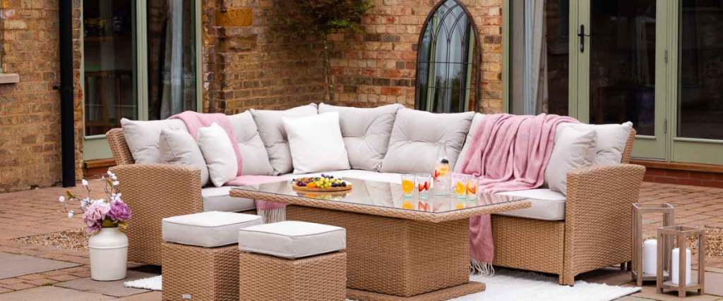 A picture of a corner dining set in a natural colour: garden furniture trends